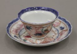 A Chinese porcelain tea bowl and saucer. The tea bowl 5.5 cm high.