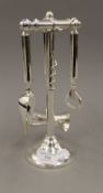 A silver plated bar tool set. 27.5 cm high.