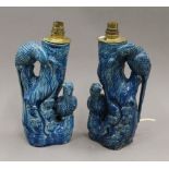A pair of late 19th century Chinese turquoise ground pottery vases, fitted as lamps.