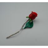 A sterling silver rose pin cushion. 5.5 cm high.