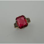 An Art Deco 9 ct gold and silver red stone ring. Ring Size M/N (3.