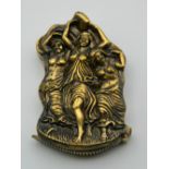 A brass vesta decorated with three girls. 5.5 cm high.