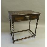 A Victorian carved oak single drawer side table. 75 cm wide.