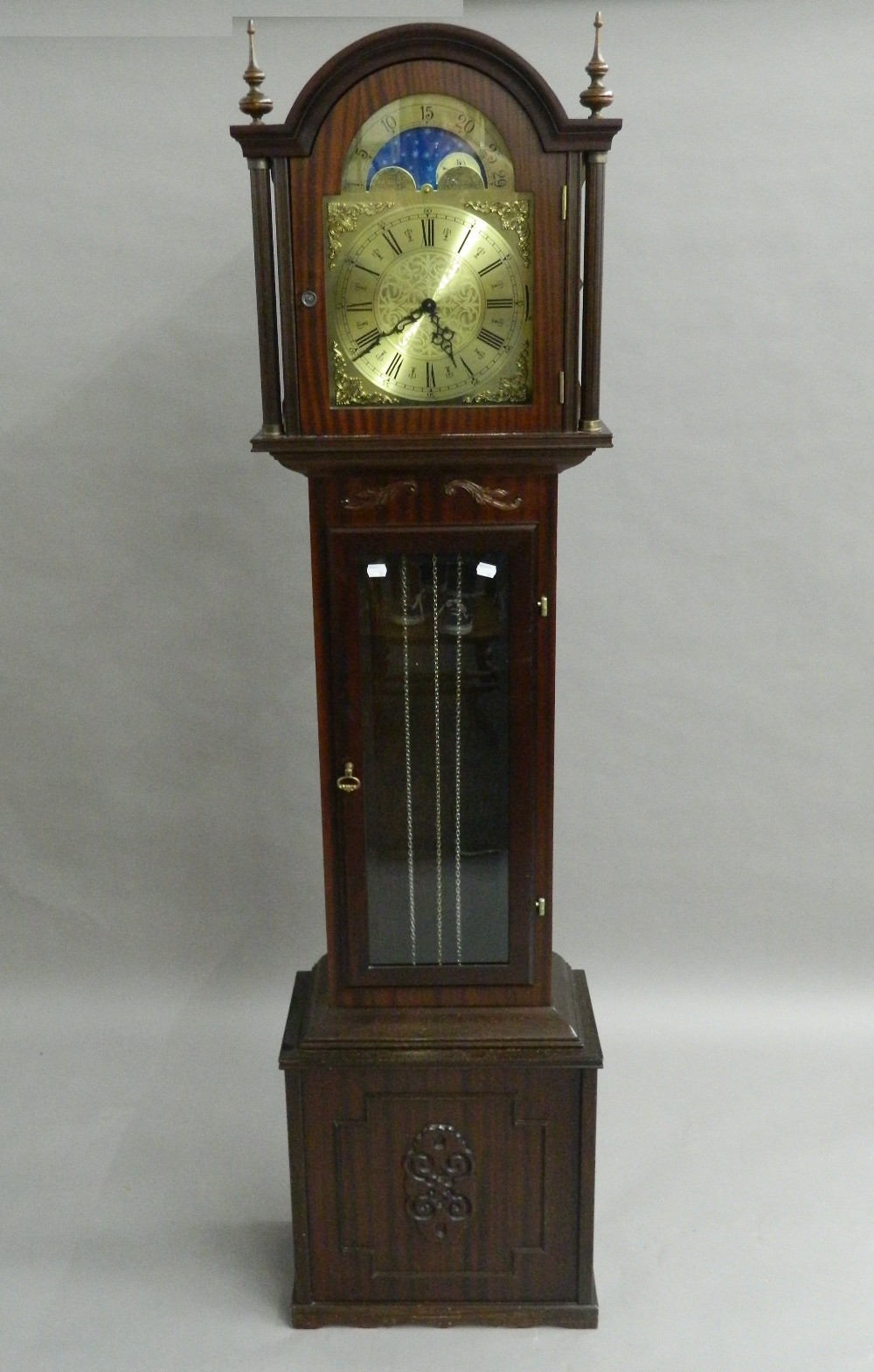 A modern longcase clock. 187 cm high.