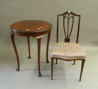 An early 20th century mahogany side table and an Edwardian mahogany chair.