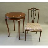 An early 20th century mahogany side table and an Edwardian mahogany chair.