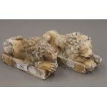 Two alabaster lions. 18 cm long x 6.5 cm wide x 9.5 cm high.