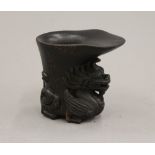 A libation cup. 8.5 cm high.