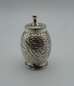 A silver sifter, possibly nutmeg. 5 cm high (10.