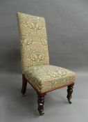 A Victorian nursing chair. 44 cm wide.