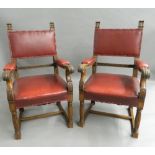 A pair of Victorian oak open armchairs. 55 cm wide.