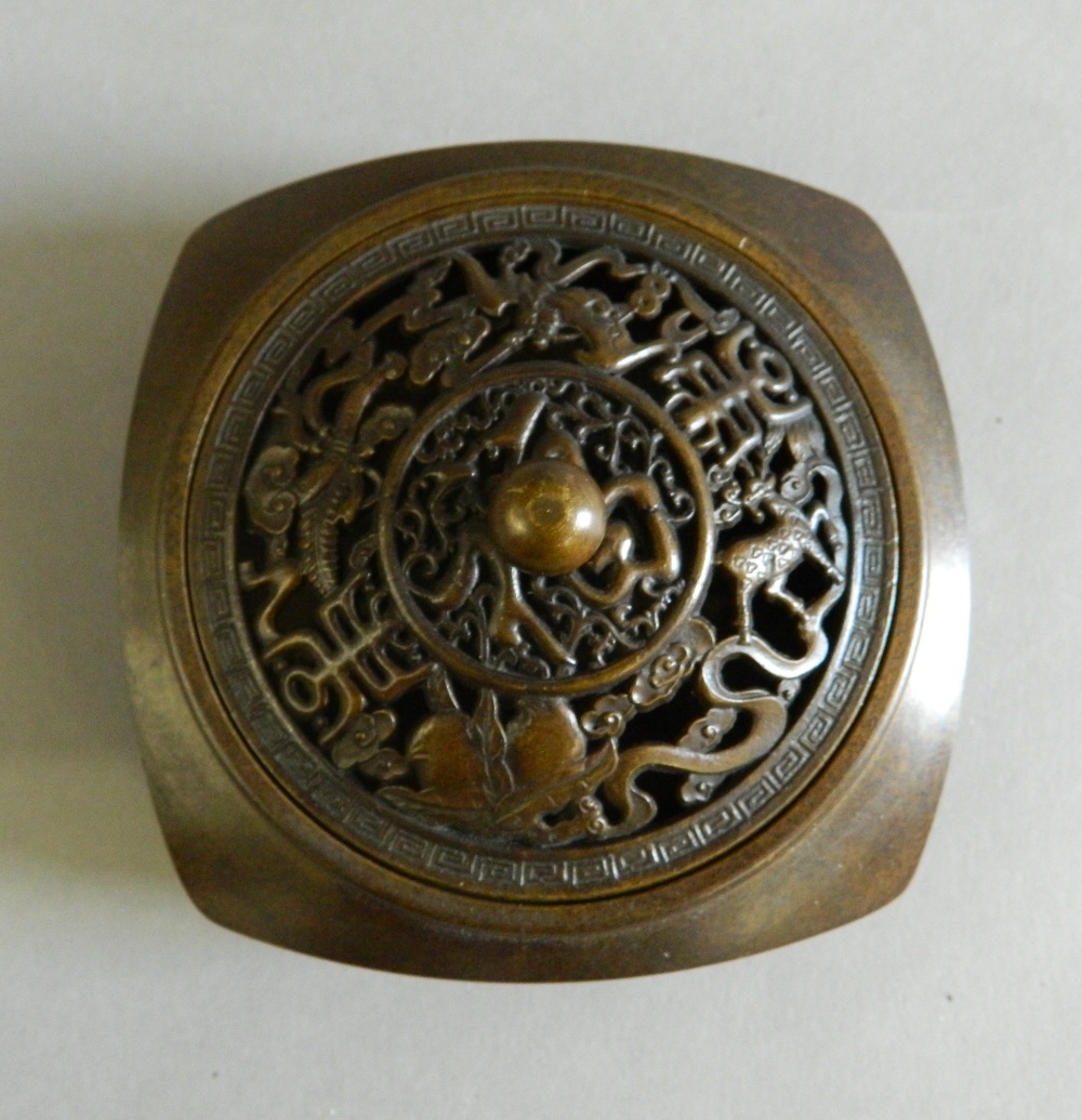 A Chinese bronze pierced topped censer. 8.5 cm wide. - Image 3 of 8