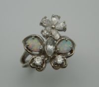 A silver cubic zirconia and opal ring. Ring Size S.