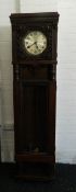 An early 20th century carved oak longcase clock. 198 cm high.