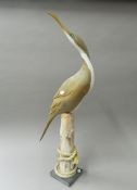 GEOFFREY BICKLEY, wooden sculpture of a Cormorant on a post, signed, titled and dated CORMORANT,