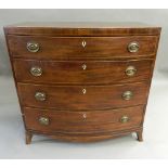 A George III mahogany bowfront chest of drawers. 95.5 cm wide.