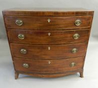 A George III mahogany bowfront chest of drawers. 95.5 cm wide.