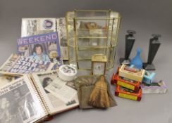 A miscellaneous collection of items including: boxed Corgi toy cars, brass mantle clock,