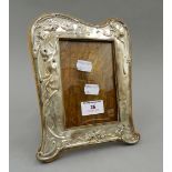 An Art Nouveau silver photograph frame. 21.5 cm high.