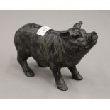 A model of a pig. 23 cm long.