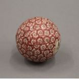 A Scottish red sponge ware carpet bowl. 8 cm diameter.