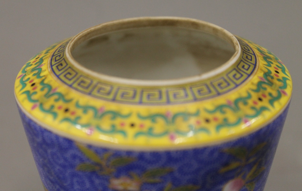 A Chinese porcelain lidded tea jar. 11.5 cm high. - Image 2 of 3