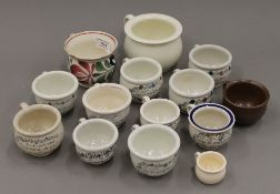 A collection of Victorian miniature chamber pots. The largest 13.5 cm wide.