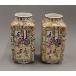 A pair of Chinese square shaped famille rose vases,
