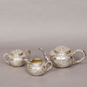A Chinese silver three piece tea set,