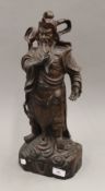 A Chinese carved rosewood figure of an Immortal. 47 cm high.