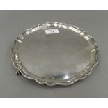 A small silver salver. 20 cm diameter (8.