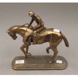 A model of a horse with jockey up. 26 cm high.