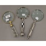 Three magnifying glasses. The largest 26 cm long.