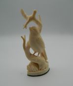 A 19th century carved ivory bird. 9.5 cm high.