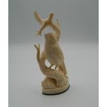 A 19th century carved ivory bird. 9.5 cm high.