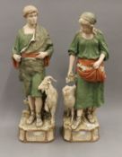 A pair of large Royal Dux porcelain figures formed as a Shepherd and Shepherdess.