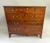 A George III mahogany chest of drawers. 103.5 cm wide.
