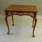 A 20th century, 18th century style, mahogany silver table. 81 cm long.