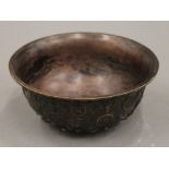 A Chinese bronze bowl. 16 cm diameter.