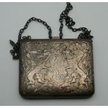 A silver purse. 9 cm wide.