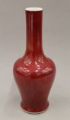 A Chinese Sang De Boeuf porcelain vase. 30 cm high.