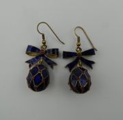 A pair of Russian enamel egg earrings. 3.25 cm high.