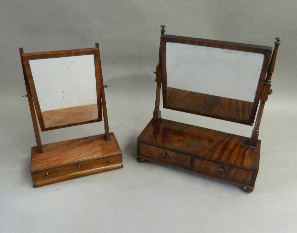 Two 19th century mahogany toilet mirrors. The largest 53.5 cm wide.