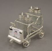 A silver plated vintage car formed cruet. 16 cm long.