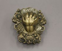 A 19th century bronze offertory hand.