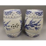 A pair of blue and white pottery barrel seats. 45 cm high.