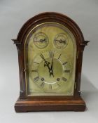 An Edwardian mahogany cased eight-day mantel clock. 32.5 cm high.