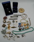 A quantity of silver and costume jewellery