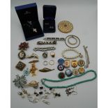 A quantity of silver and costume jewellery