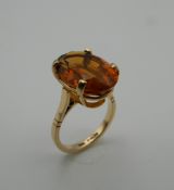 A 9 ct gold citrine ring. Ring Size N (5.